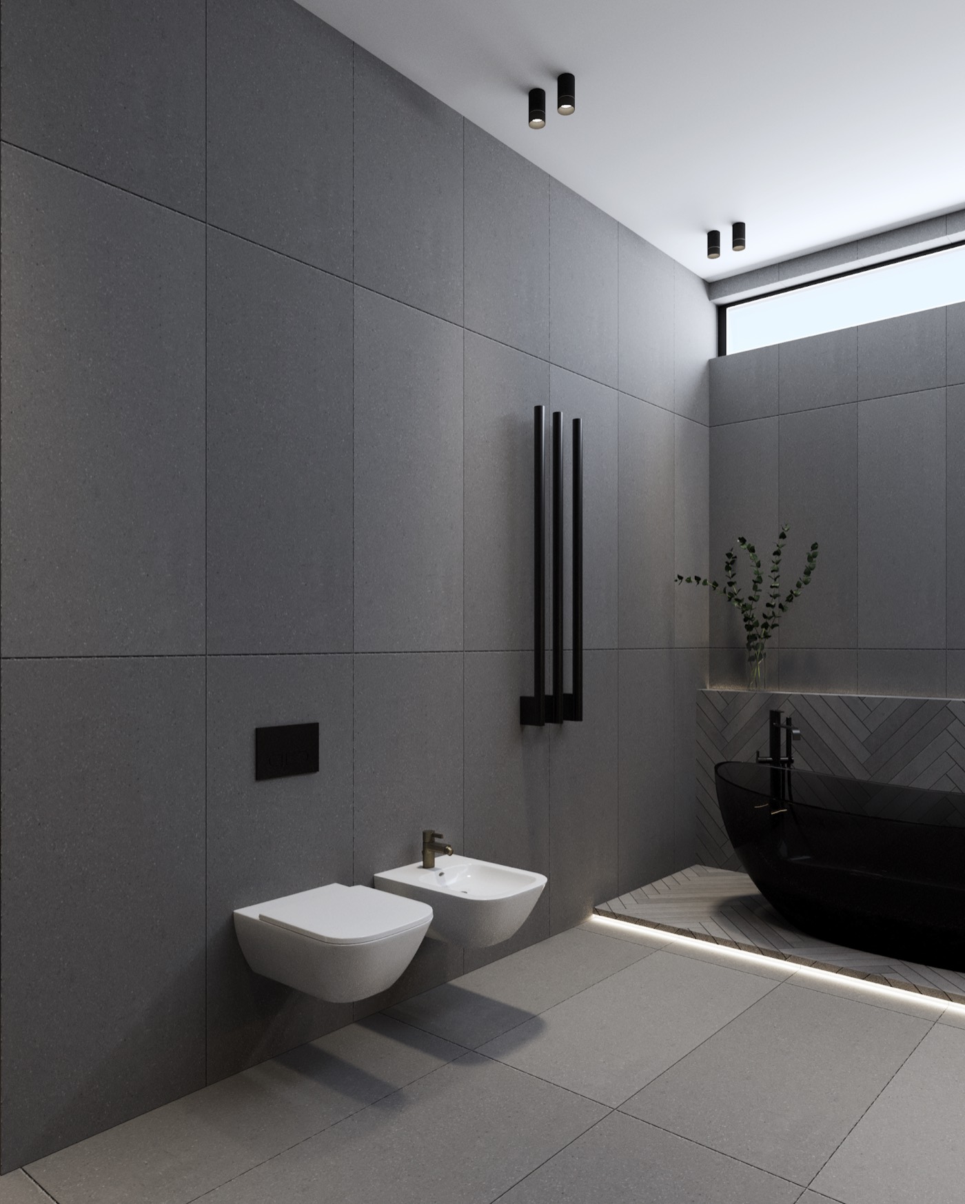 Wall-hung WC and bidet against black tile, the tub beyond