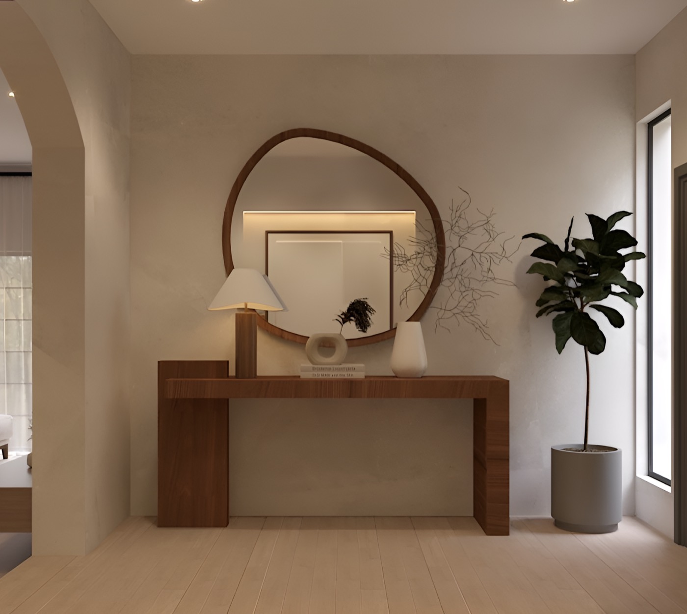 Arched niche holding a round mirror above a timber console and a potted plant