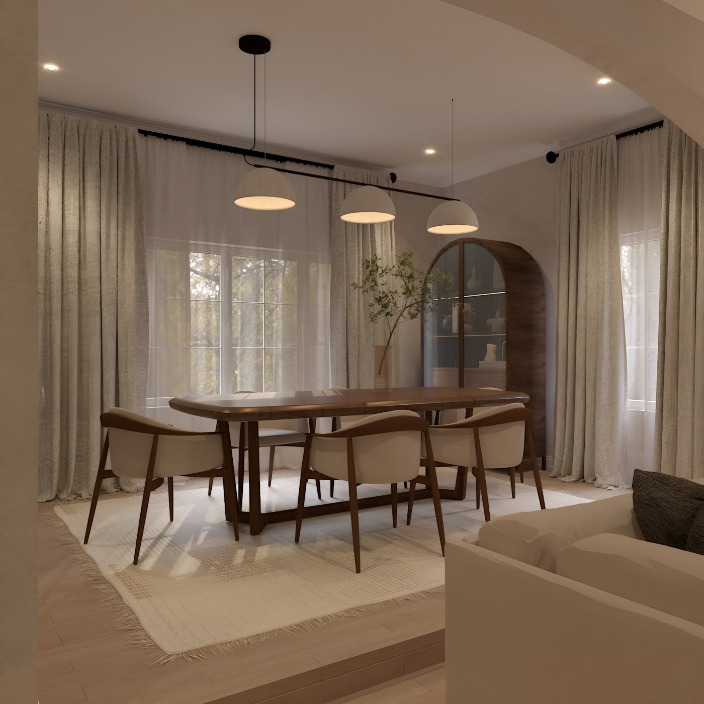 Dining end of the room with the curtains drawn across the glazing