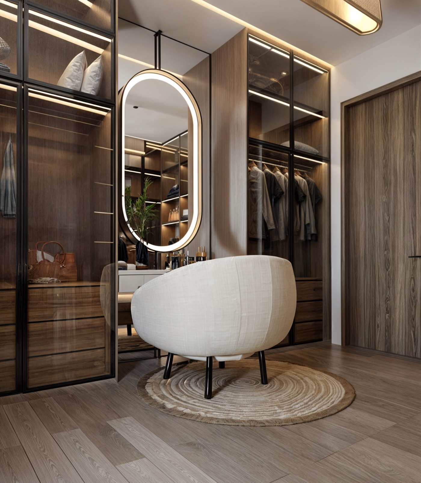 Dressing room with a round rug, backlit mirror and open hanging