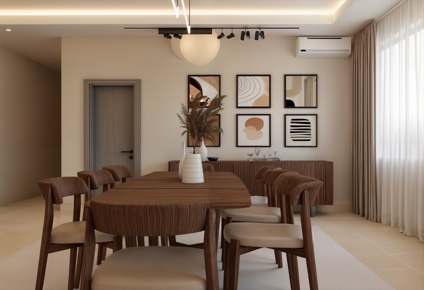 Dining table with a dried arrangement, framed prints ranged behind