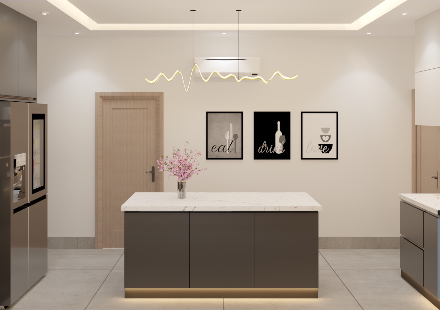 The island head-on beneath a linear pendant, dark cabinetry behind
